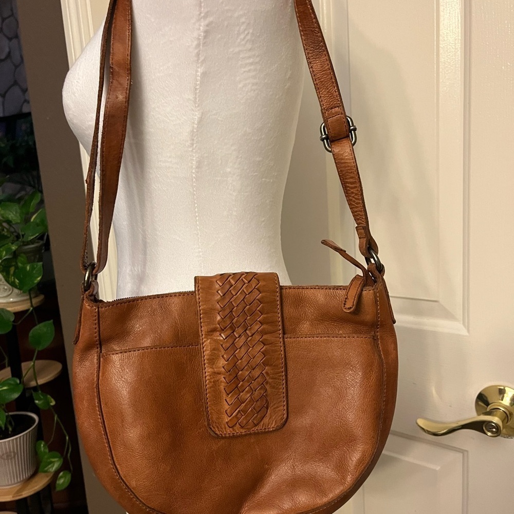 VILENCA Tan Leather Crescent Shoulder Bag with Flap Closure.
